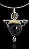 Photo of pendant with gold, silver and semi-precious stones.